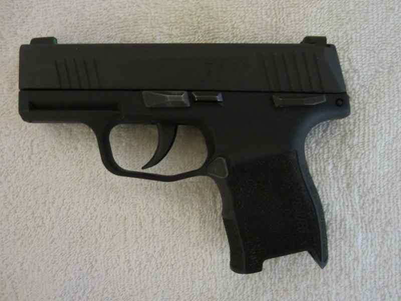 Sig P365 3-10 rd mags less than 300 rds fired $450