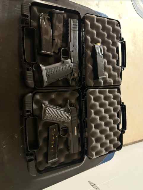 Two Rock Island Armory .45’s