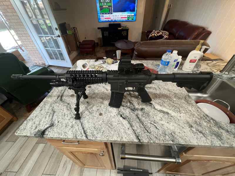 Bushmaster AR 15. Loaded.  