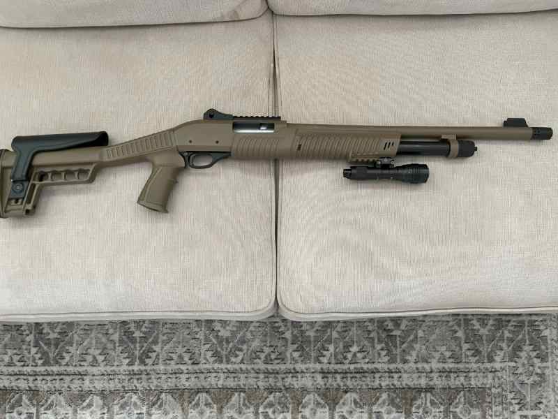 ATA  Etro 12 ga shotgun with PROTAC 10 tap light